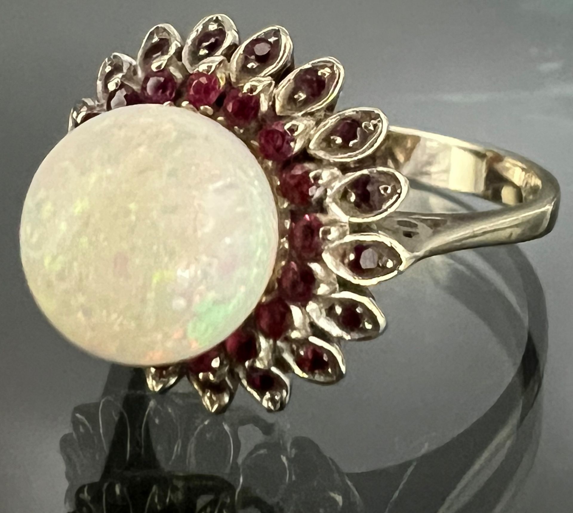 Ladies' ring 750 white gold with an opal ball and 36 small red coloured stones. - Image 2 of 5