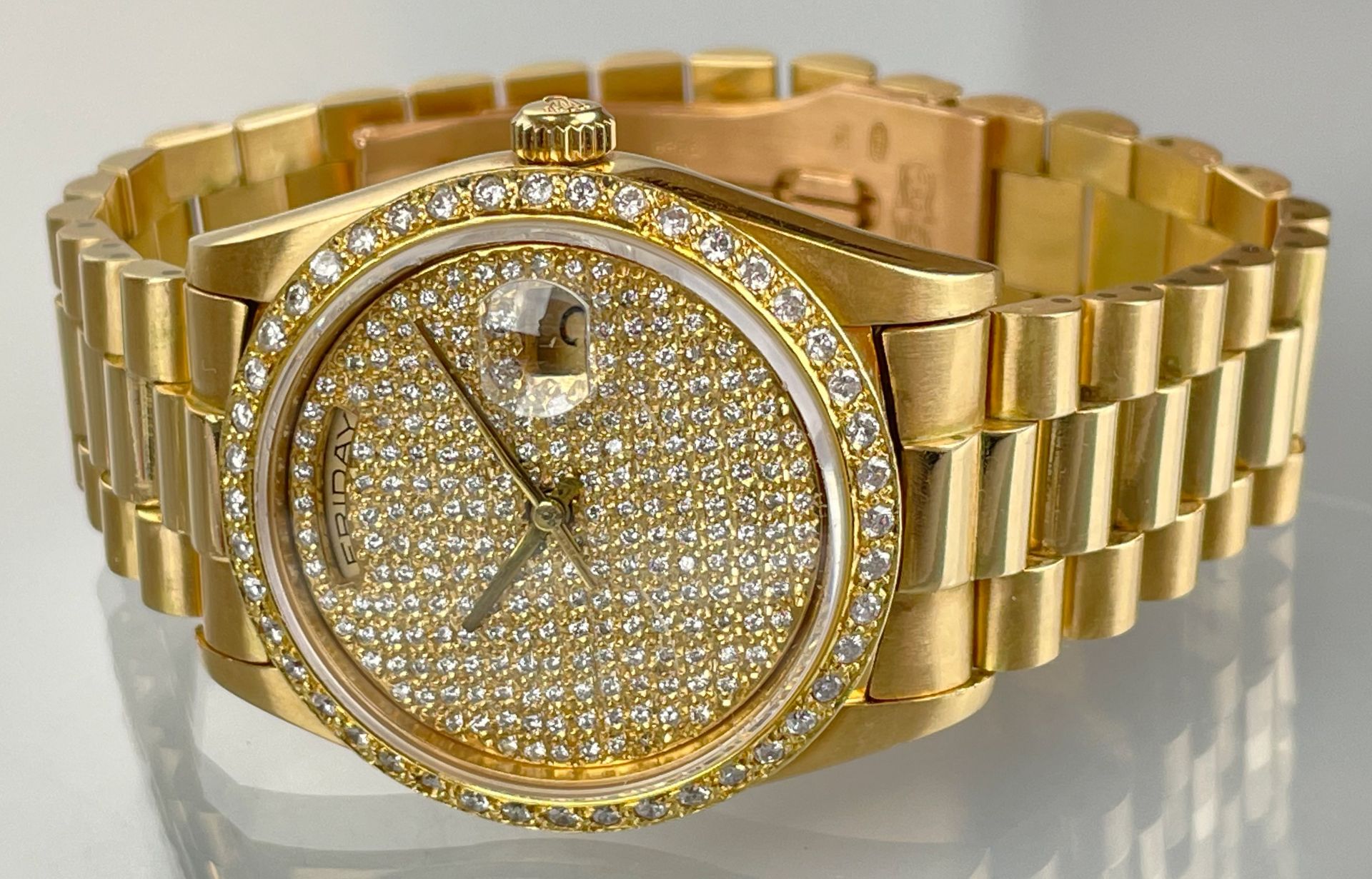 Wristwatch ROLEX Day-Date 750 yellow gold with diamonds. End of the 1980s.