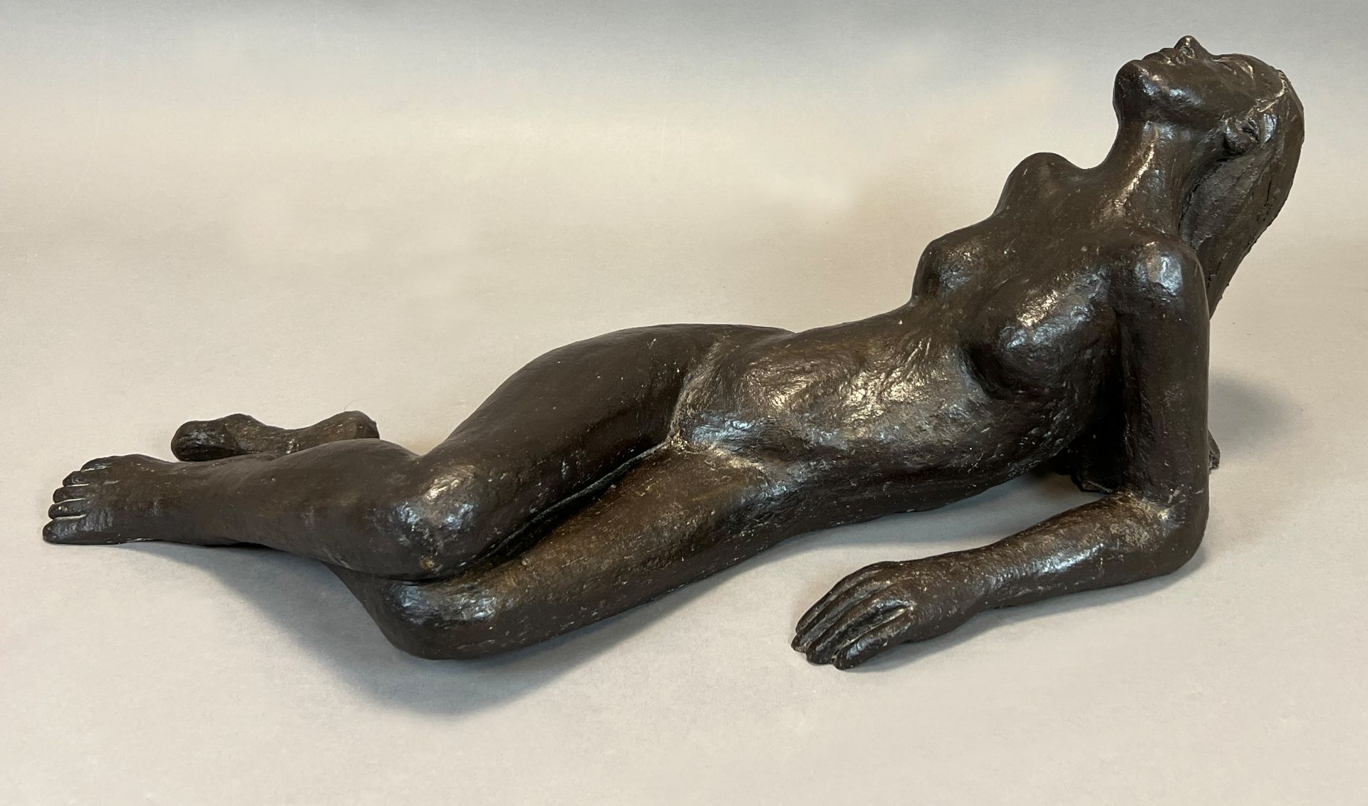 MONOGRAMIST (XX). Reclining female nude. Bronze.