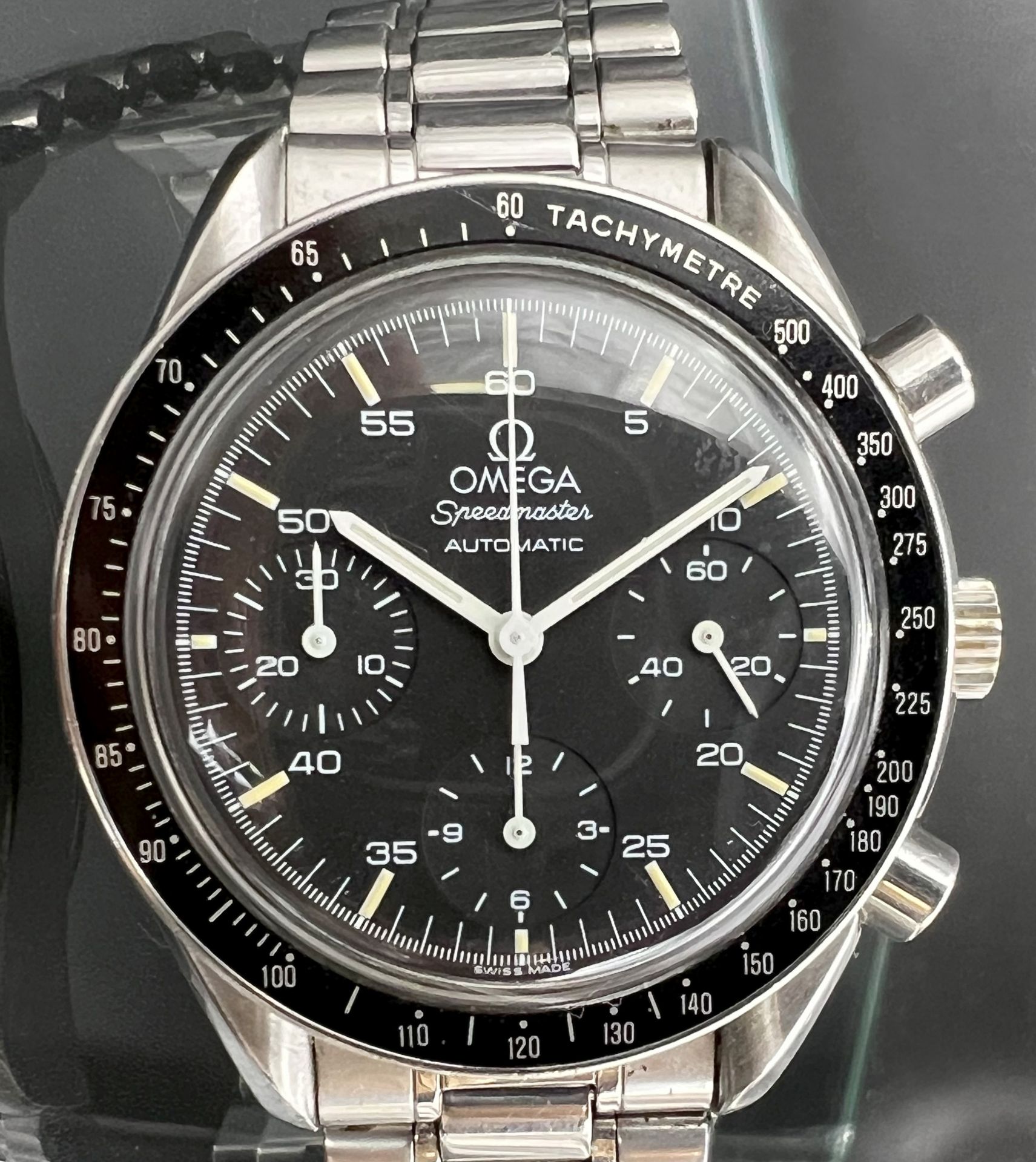Men's wristwatch OMEGA Speedmaster. Chronograph. Automatic. Swiss.