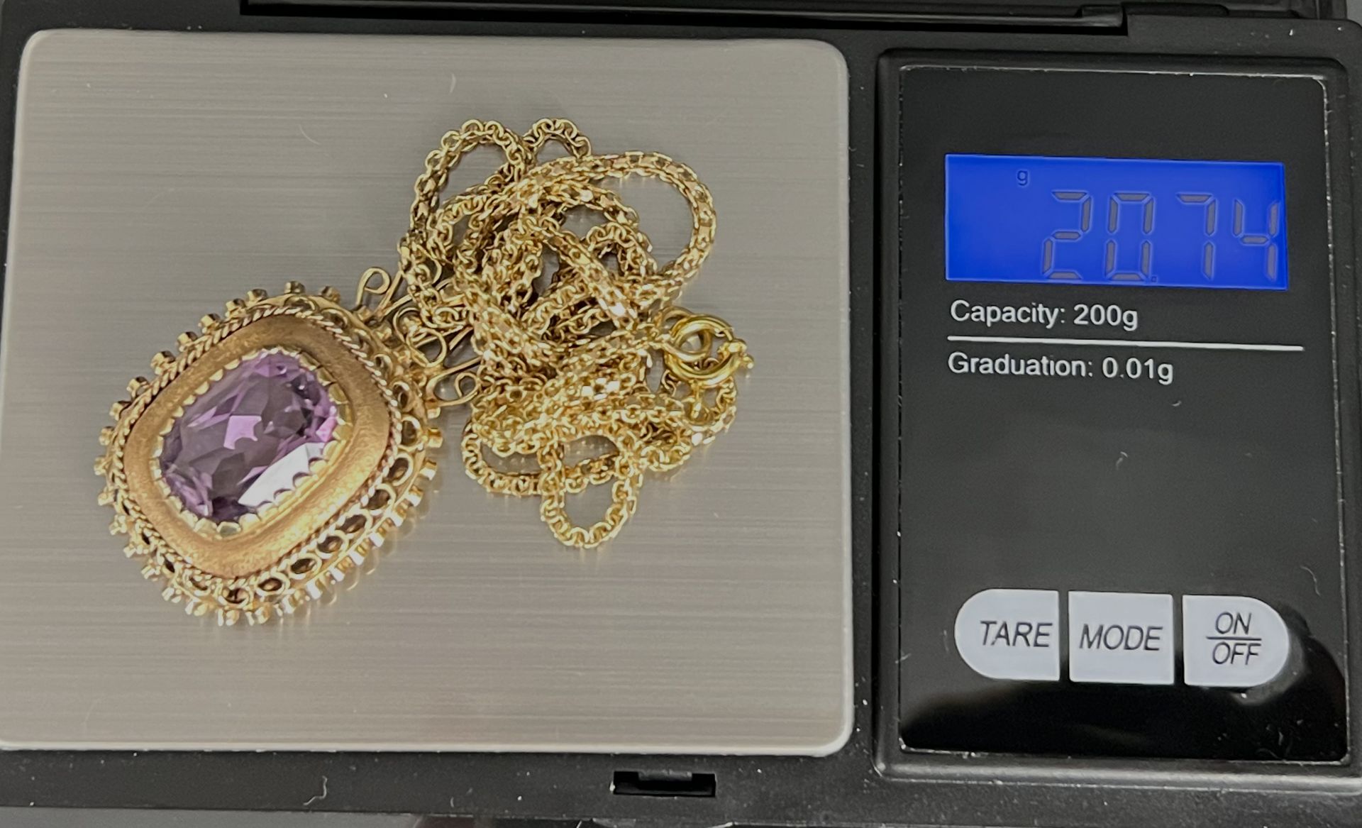 Halskette mit Anhänger in 585 Gelbgold. Wohl Amethyst. - Bild 7 aus 7