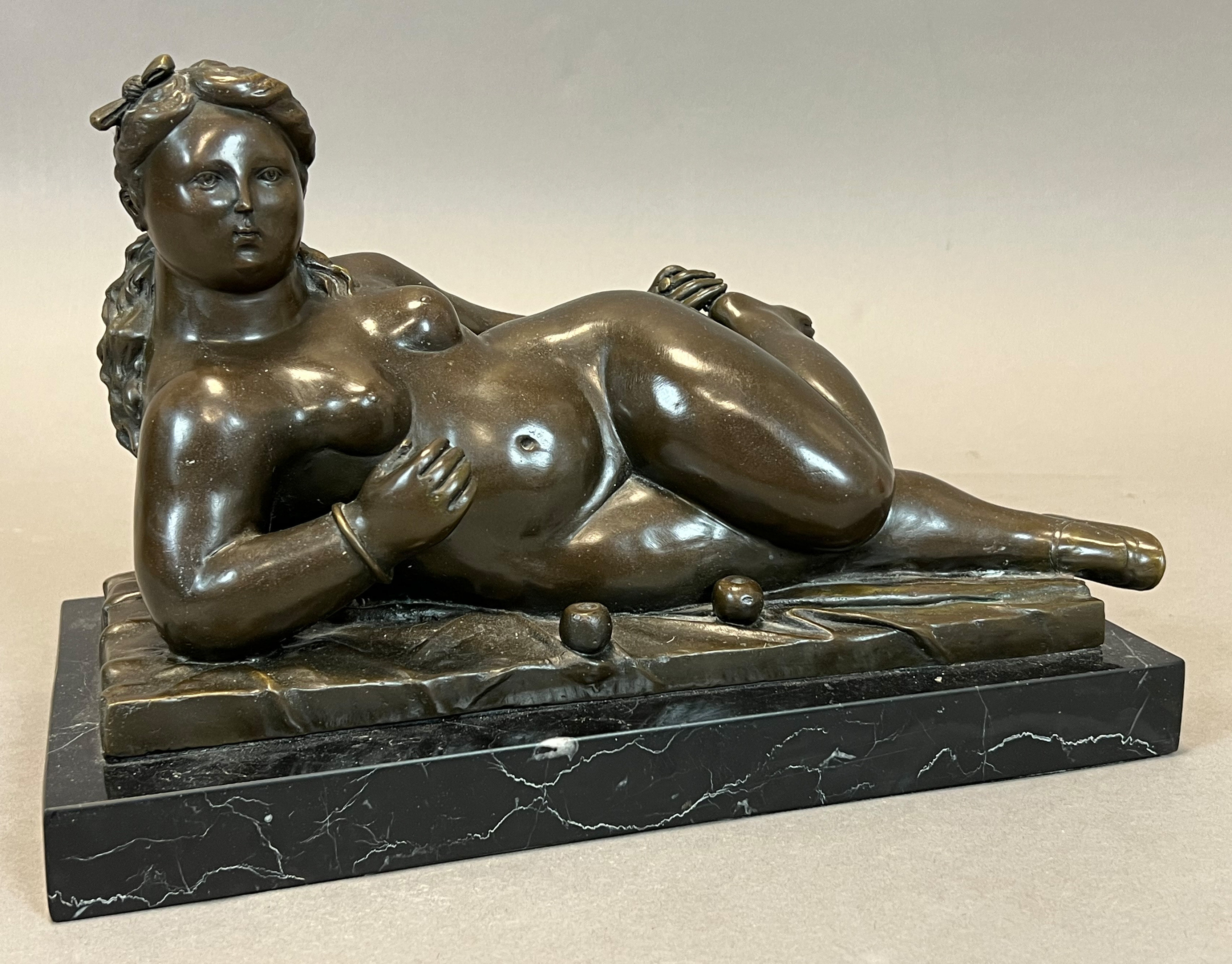 Nach Fernando BOTERO (1932). Reclining Woman. Bronze.