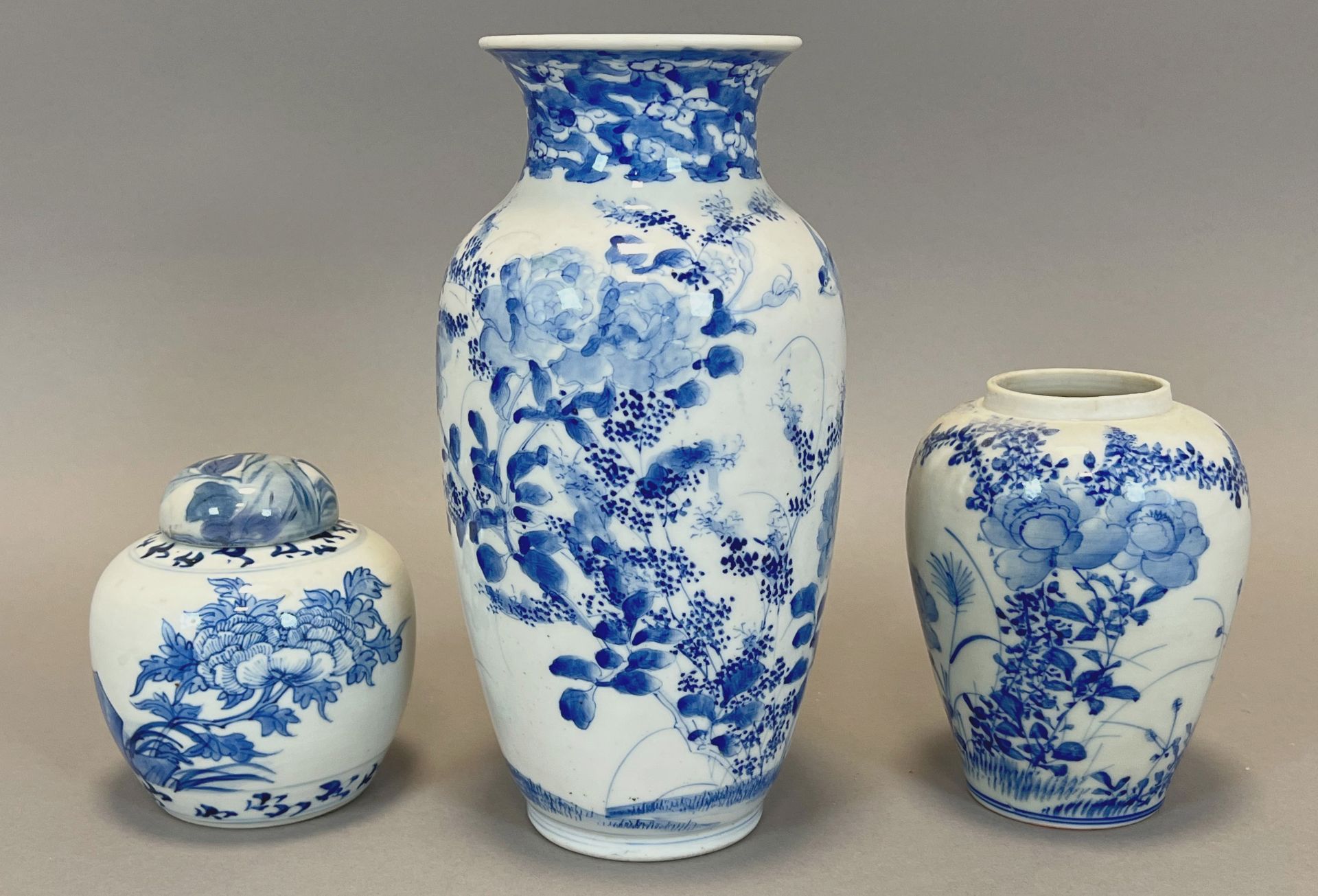 Three blue and white vases with floral decoration. China. Around 1900.