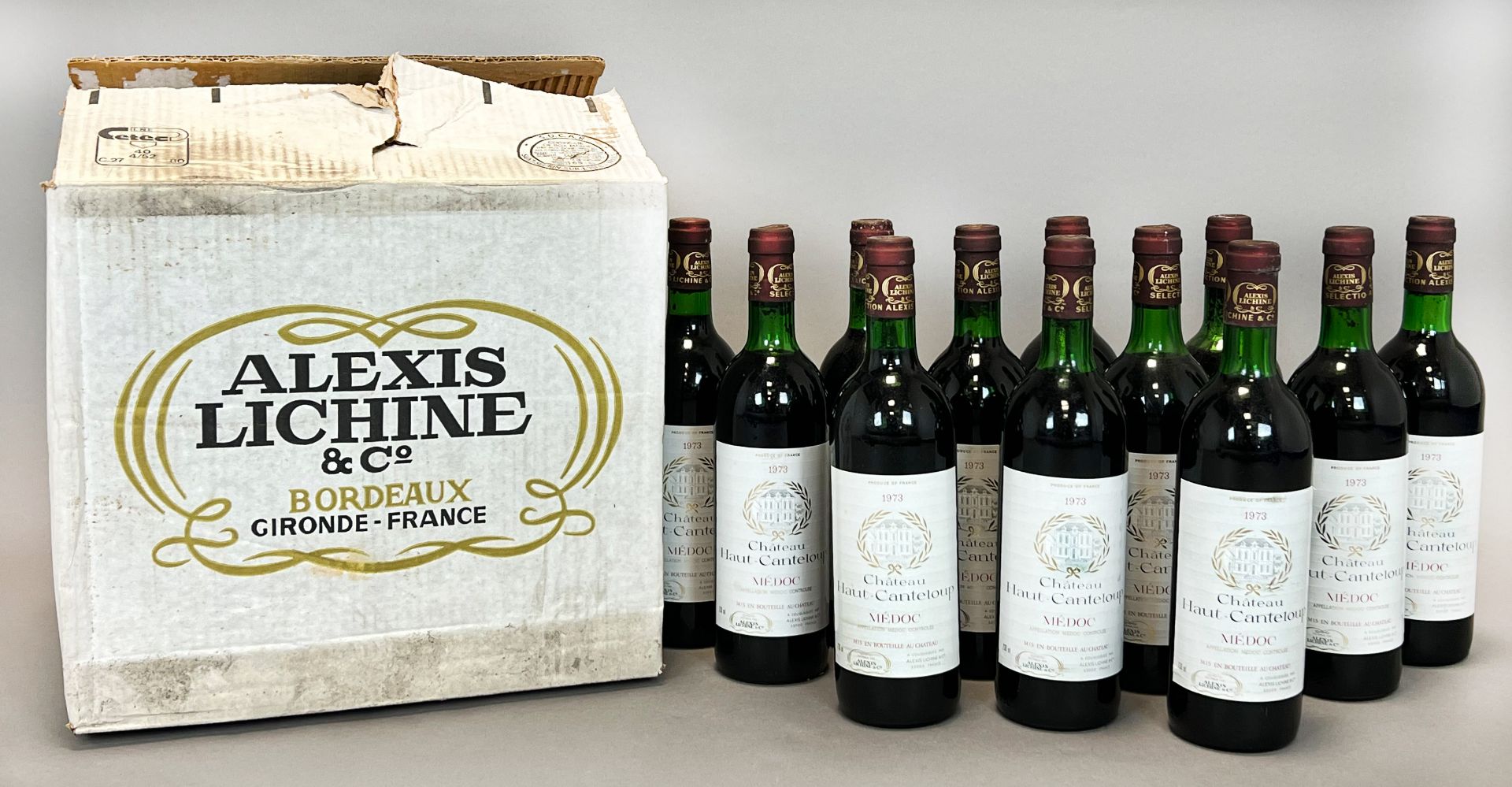 12 bottles of red wine. Alexis Lichine. Château Haut-Canteloup. Médoc. 1973. Wine box.