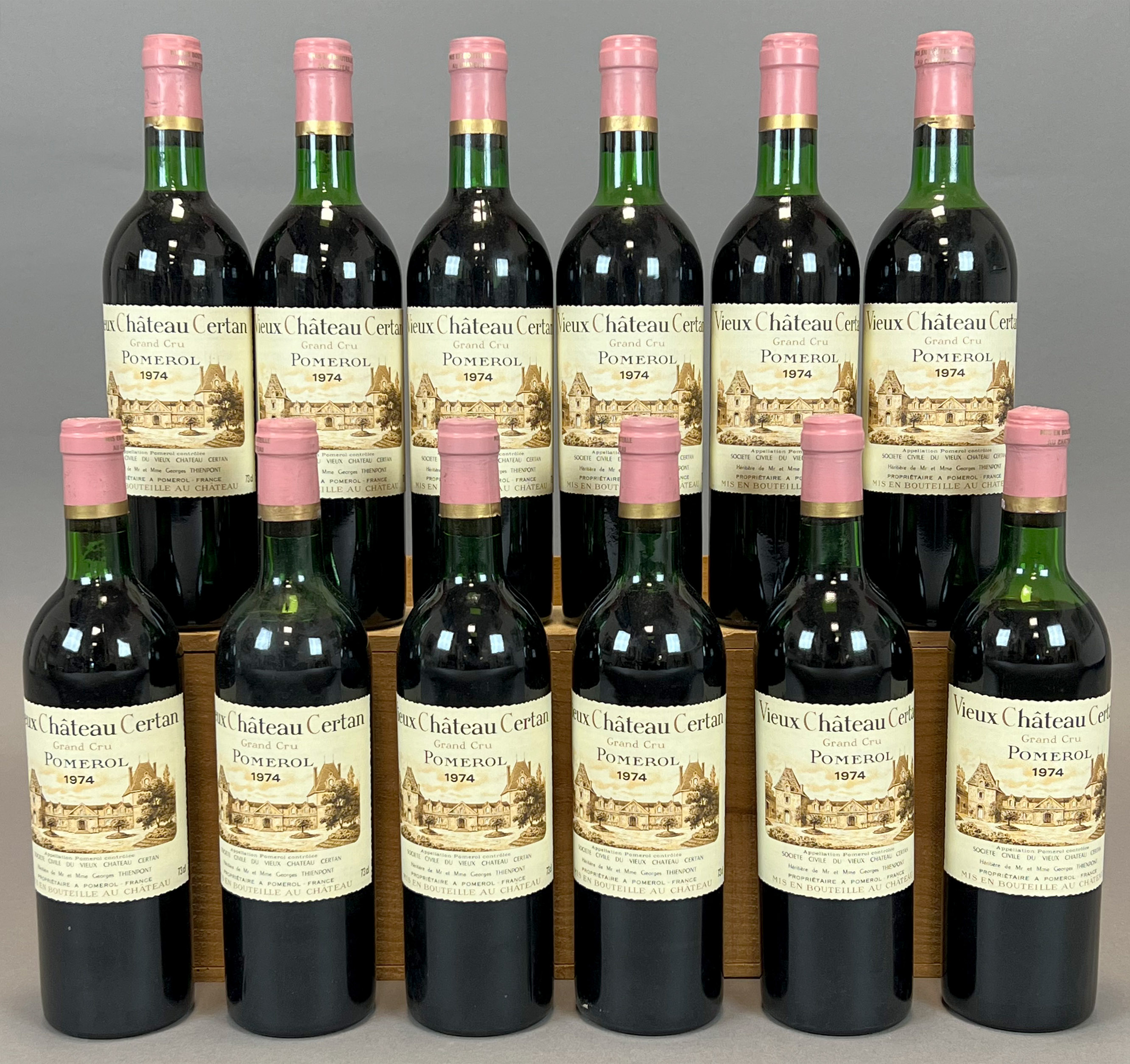 12 bottles of red wine. Vieux Château Certan. Pomerol. 1974. France.