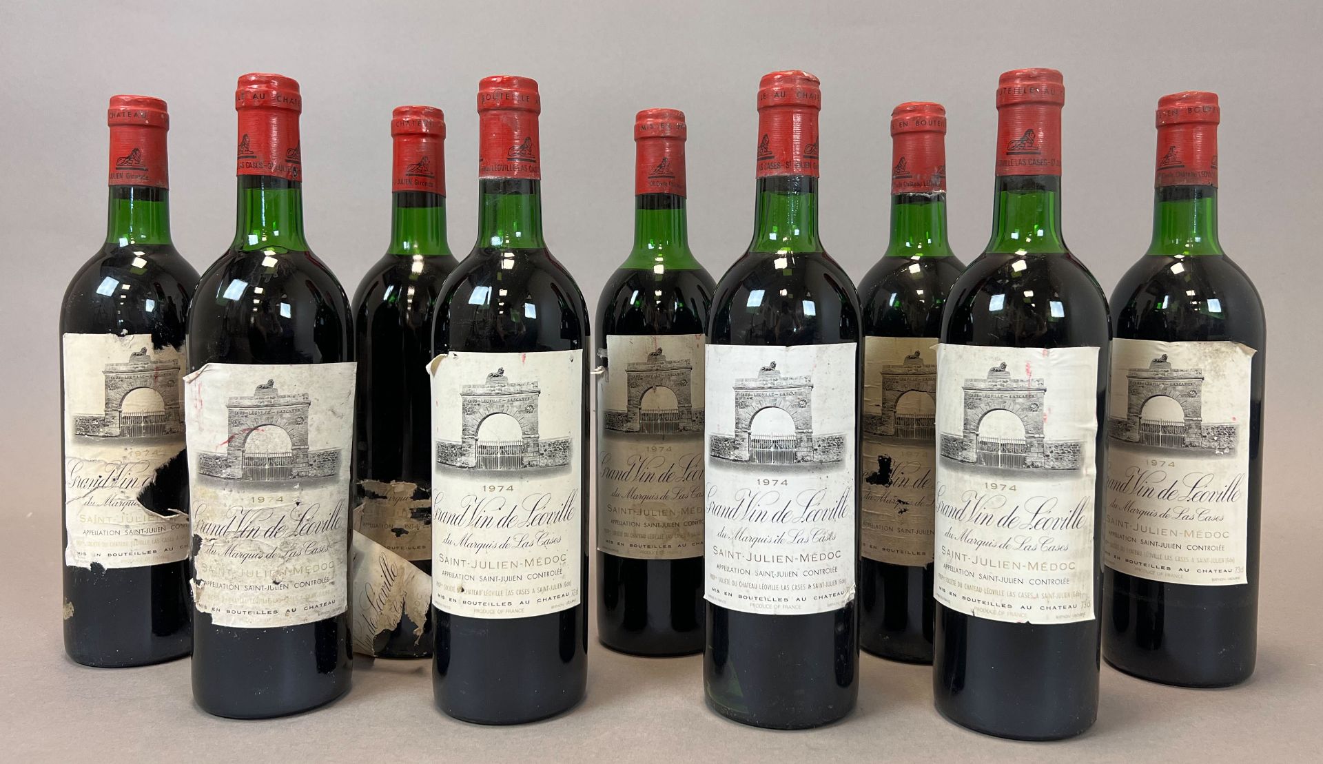 9 bottles of red wine. Château Léoville du Marquis de Las Cases. 1974. <br>St. Julien