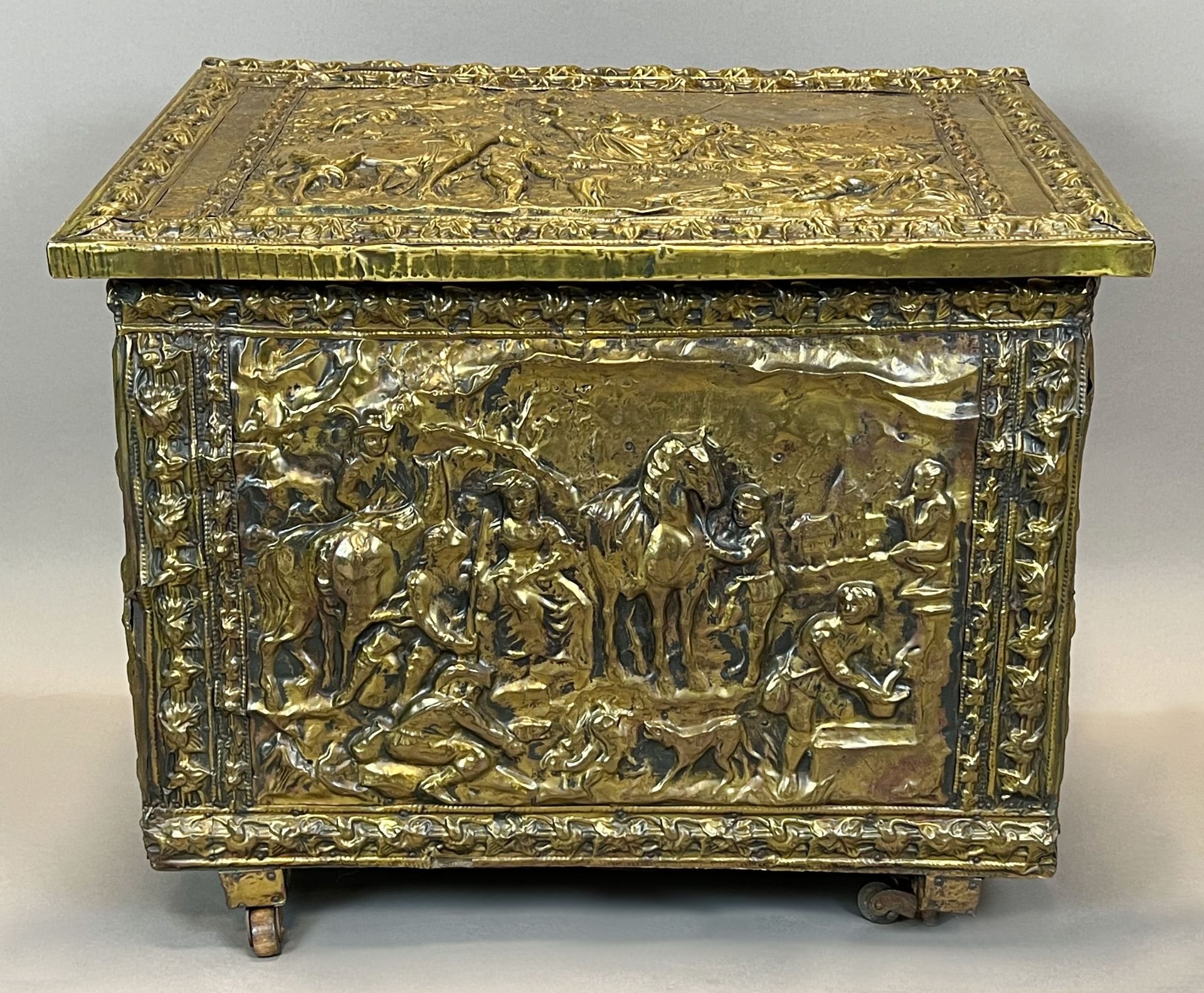 Small wooden chest with brass plate decoration. Probably 19th century.
