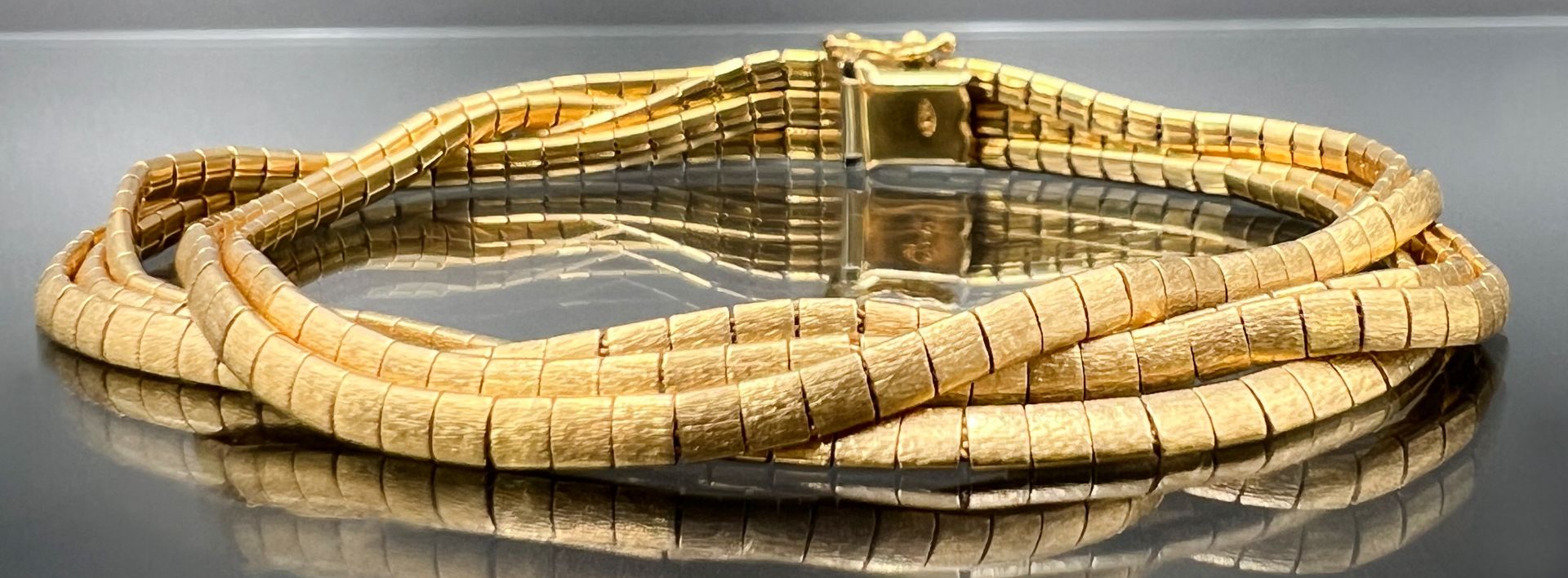 5-row bracelet 750 yellow gold.