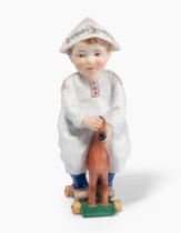 Meissen, Figur "Kind mit Zeitungsmütze, auf einem Holzpferd reitend".