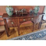 A Superb Georgian Mahogany bow front Sideboard with ebony inlay and brass ring handles on square