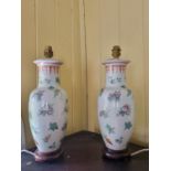 A good pair of Oriental table Lamps with hand painted decoration.