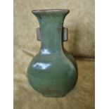An Chinese green ground Vase. 26h x 16w.