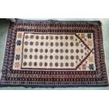 A good Persian Rug with unique medallion design and multi borders. 112 x 76cm approx.