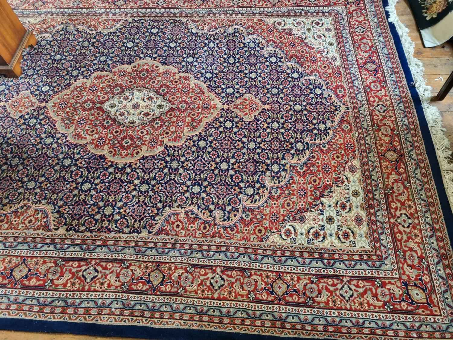 A very large blue ground Hindu Persian Carpet with medallion design and multi borders. - Image 2 of 2