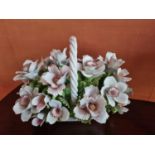 A really good Italian Porcelain Centrepiece depicting a large basket of flowers. 51 x 30 x H 35 cm