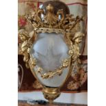 A really good Brass hall Lantern profusely embossed with Cherubs with a cloudy glass shade.