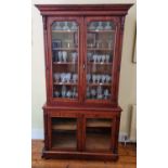 A really good 19th Century two door Bookcase with glazed upper and lower sections on moulded and