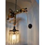 An unusual hanging Light featuring a cherub holding a basket light. Drop 30 cm approx.
