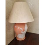 An Italian made large bulbous pink ground Table Lamp depicting a pair of swans in full flight. H