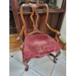 A good 19th Century Walnut Armchair with cabriole supports and stretcher base. W 66 x SH 44 x BH