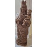 A good Timber Statue of The Madonna and Child H56 cm approx., along with a lead plaque. 33 x 15cm