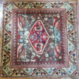 A small Persian Rug with brown and yellow ground and central medallion design, well worn.