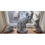 Two Italian Porcelain Cat Figures along with three pottery figures of rabbits. Tallest being 36 cm