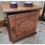 A 19th Century Walnut Cupboard with ormolu lifting handles on turned supports. W 56.5 x 54 x H 59 cm