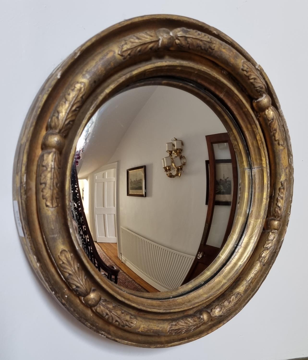 A lovely Regency Mahogany Convex Mirror of circular form. D 35.5 cm approx.