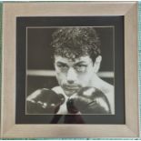 A Classic Photograph of a Boxer along with other classic photographs. One by Michael Caan 'The