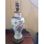 A good early Oriental Table Lamp with hand painted decoration.