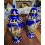 A good pair of Blue ground Urns. H 37 cm approx.