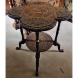 Of really fine quality. A late 19th century Oak Side Table profusely carved with a central