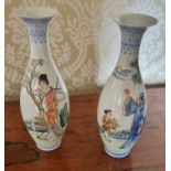 A nice pair of hand painted Oriental Bud Vases. H 15 cm approx.