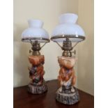 A really good pair of Porcelain Table Lamps depicting squirrels eating nuts. H 28 cm approx.