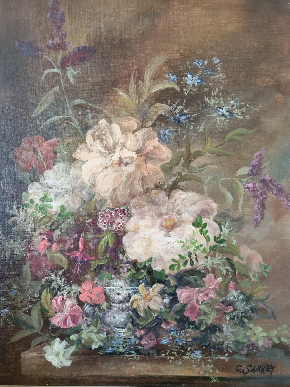 An early 20th Century Oil on Canvas still life of flowers in a vase on a table setting. Signed C - Image 3 of 3