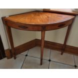 A 19th Century Sheraton Side Table of unusual form with a sunburst inlaid top and inlaid frieze