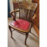 A good office/bankers Chair with Red leather seat. 43 x 43 cm approx.