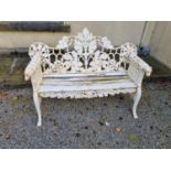 A superb very heavy cast Iron garden Bench with Oak leaf decoration and dog head arms.