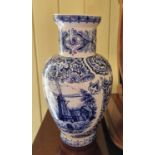 A pair of Blue and White Vases with Dutch scenes.