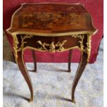 A really good 20th Century Rosewood and Inlaid Centre Table with serpentine outline, splayed legs,