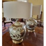 A large pair of table Lamps with floral design.