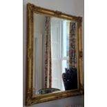 A modern Timber and Plaster Gilt rectangular Mirror with bevelled edge glass. 107 x 77cm approx.