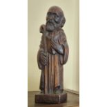 A Timber Carving of a Saint Roman. H 31 cm approx.