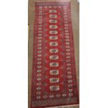 A good red ground Runner with repeating diamond design. 223 x 81cm approx.