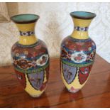 A good pair of 19th Century Cloisonne Vases. (slight damage to one). H 24 cm approx.