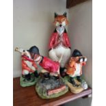 A good figural group of Foxes along with two Naturecraft caricature figures of Foxes. Tallest
