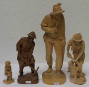 Vier Holzfiguren