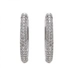 Pair of Creole earrings made in 18 kt white gold, set with 150 brilliant cut diamonds, H color, VS