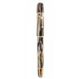 VISCONTI "FEDERICO II" FOUNTAIN PEN, RAGTIME.Body in brown and pearl white celluloid with gold